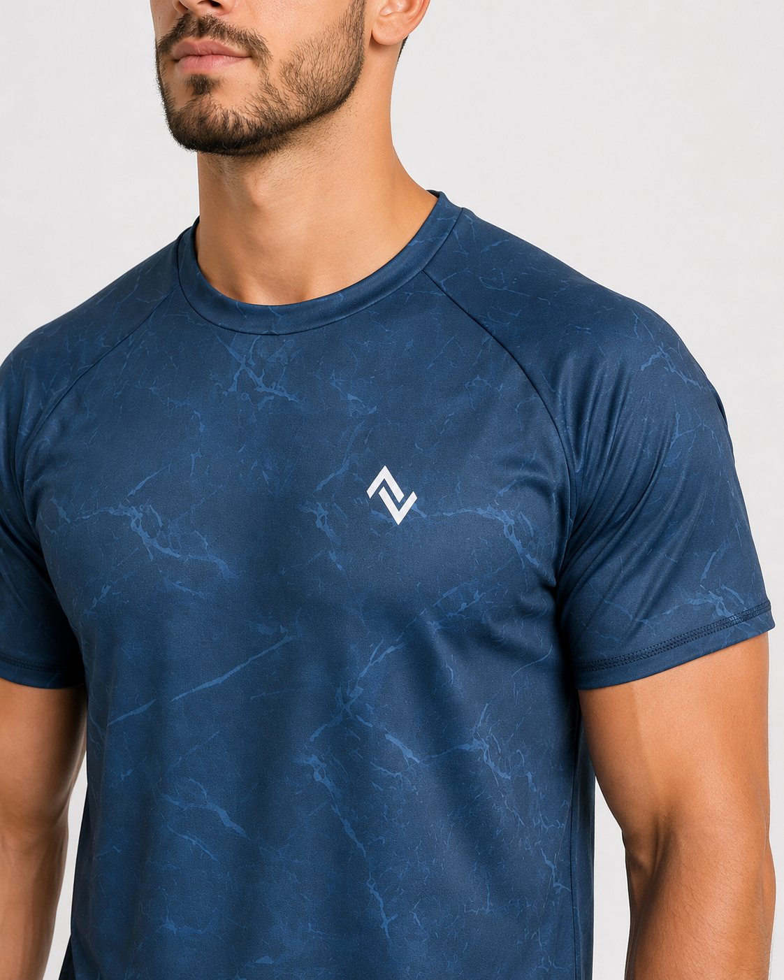 Men’s navy marble performance T-shirt with small white logo