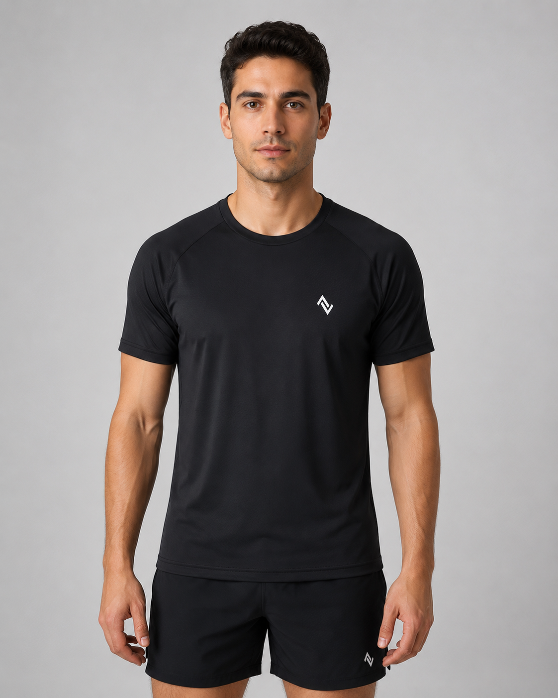 Men’s solid black performance T-shirt with small white logo